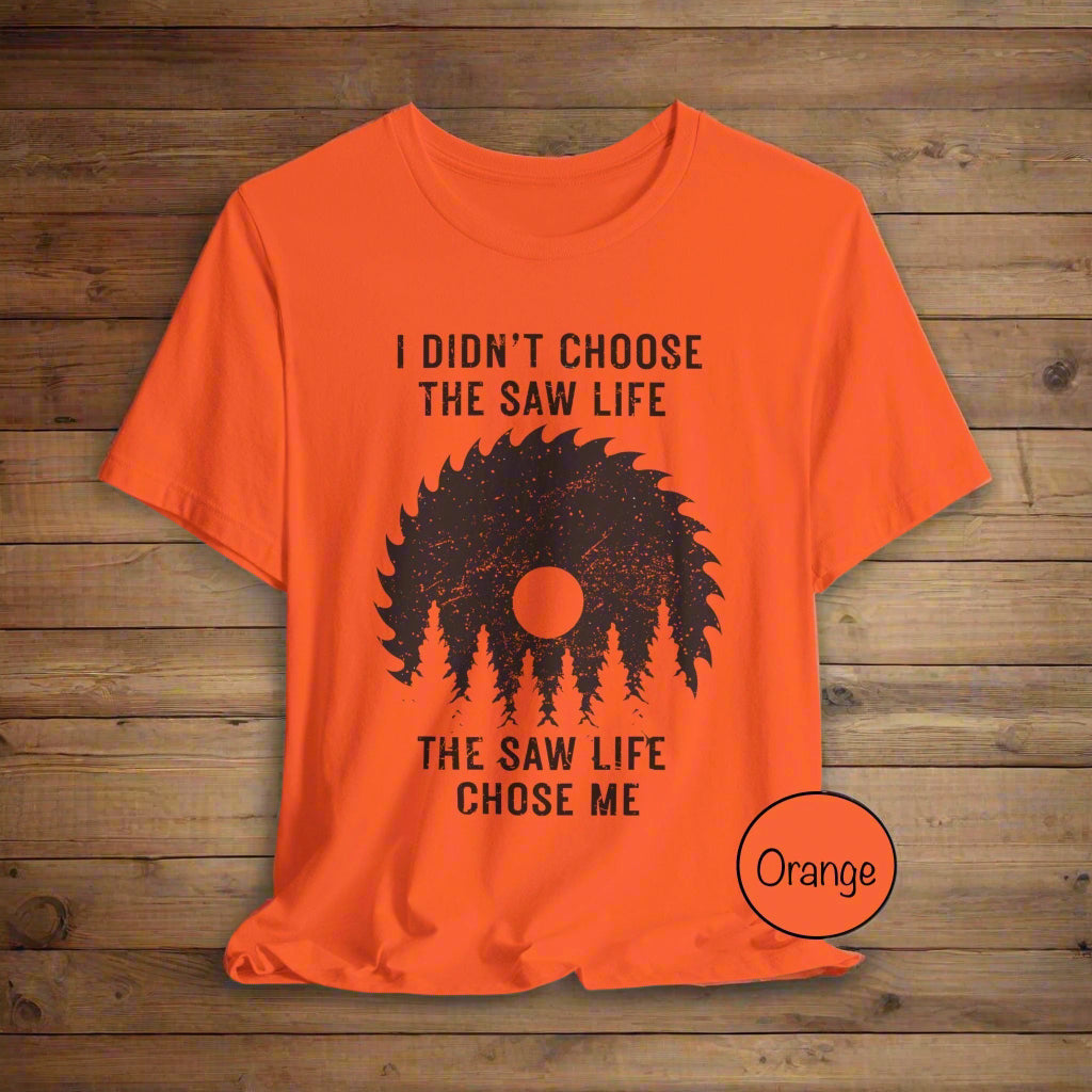 Orange t-shirt with black graphic and text on a light gray background