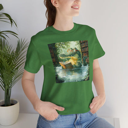 Person wearing a green t-shirt with a graphic design of a person reading a book by a lake.