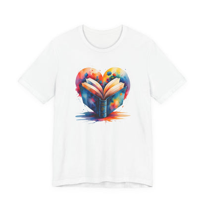 White t-shirt with a colorful heart design featuring an open book on a white background
