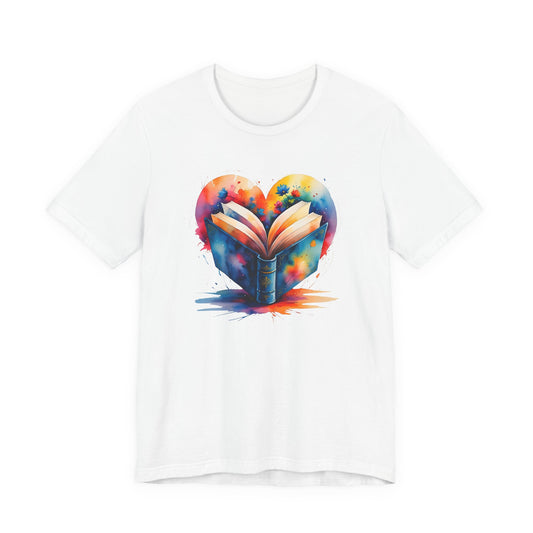 White t-shirt with a colorful heart design featuring an open book on a white background