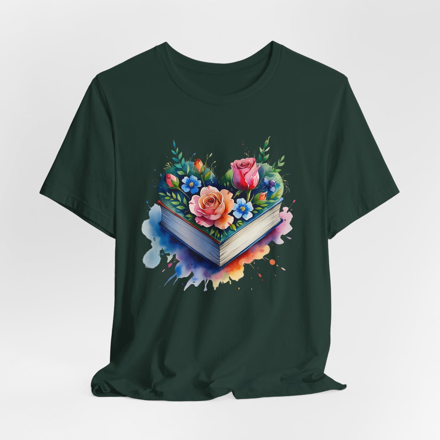 Dark green t-shirt with a colorful book and floral design on a light gray background