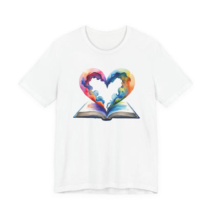 White t-shirt with a colorful heart design on an open book