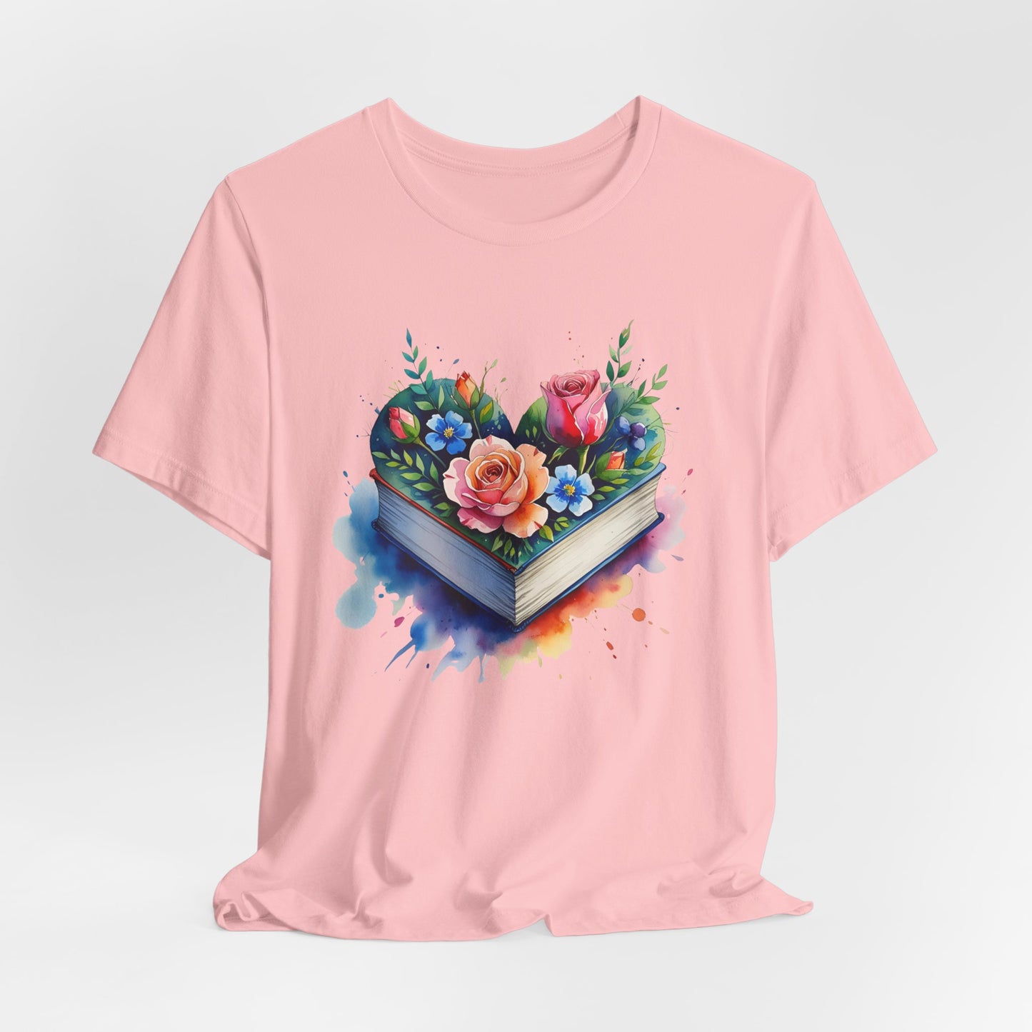 Pink t-shirt with a floral heart design on a white background