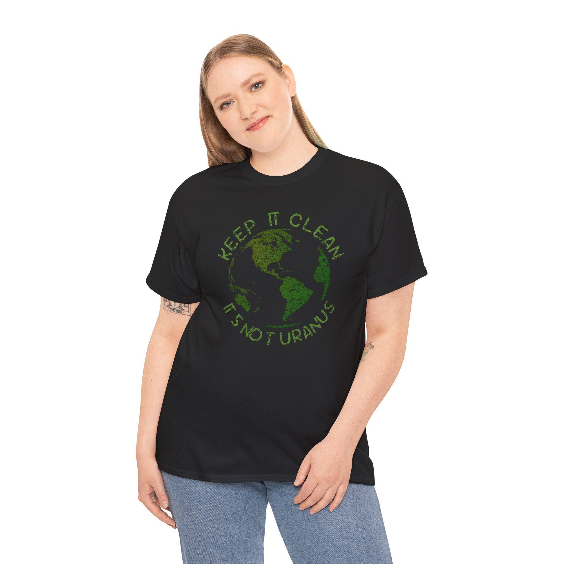 Person wearing a black t-shirt with a green graphic and text on a white background