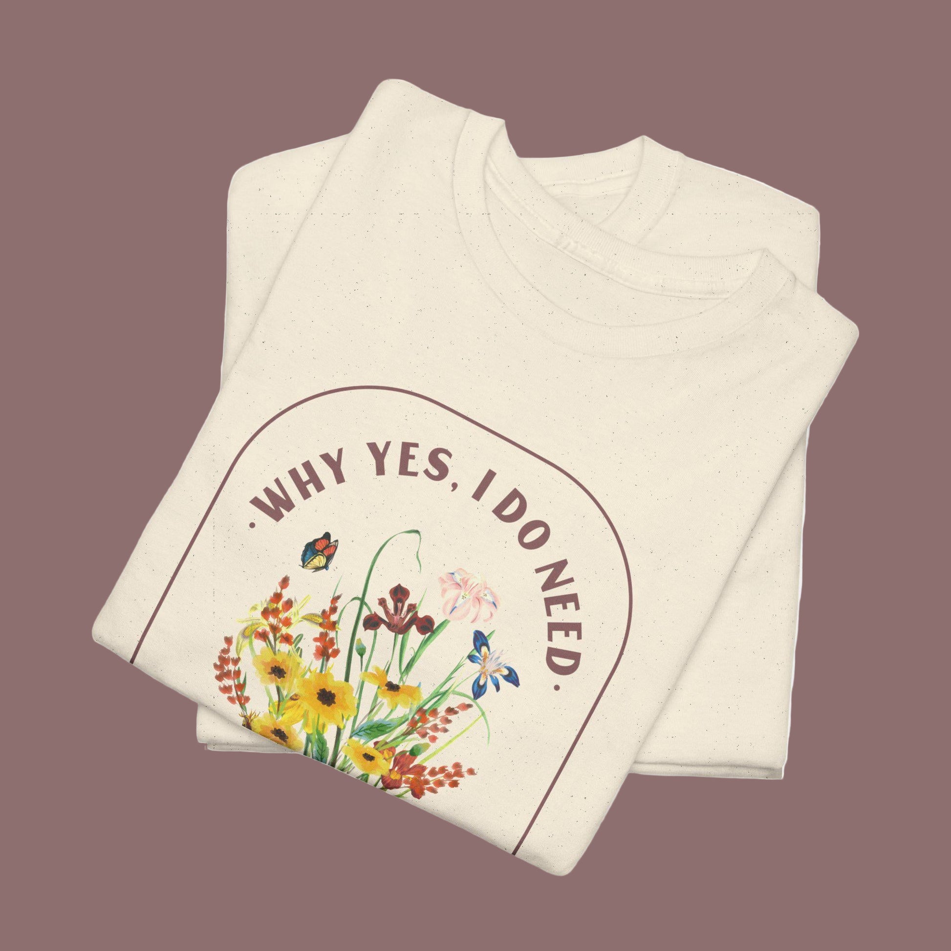 Folded fabric with floral design and text on a white background