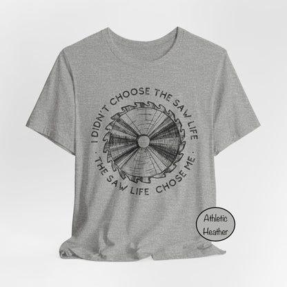 Gray t-shirt with graphic design and text on a white background