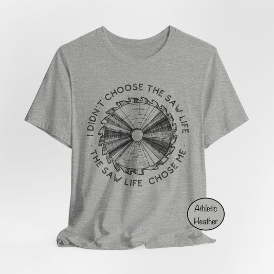 Gray t-shirt with graphic design and text on a white background