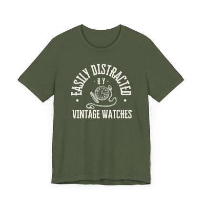 Green t-shirt with white text and graphic on a white background