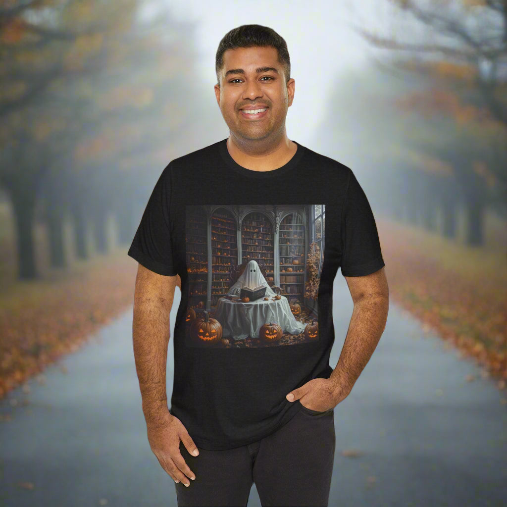 Man wearing a black t-shirt with a graphic design, standing in front of an autumn-themed background with trees and animals.