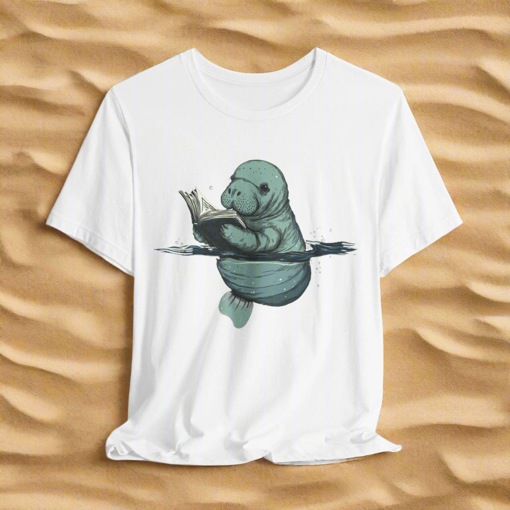 White t-shirt with a graphic of a seal holding a book on a white background