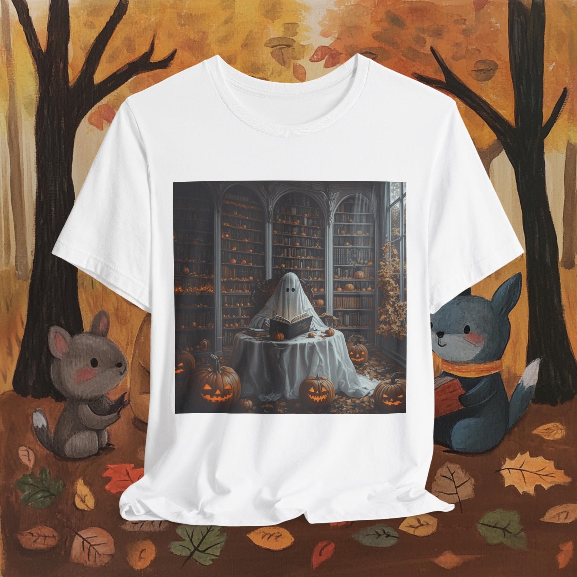 White t-shirt with a ghost reading a book design on an autumn-themed background