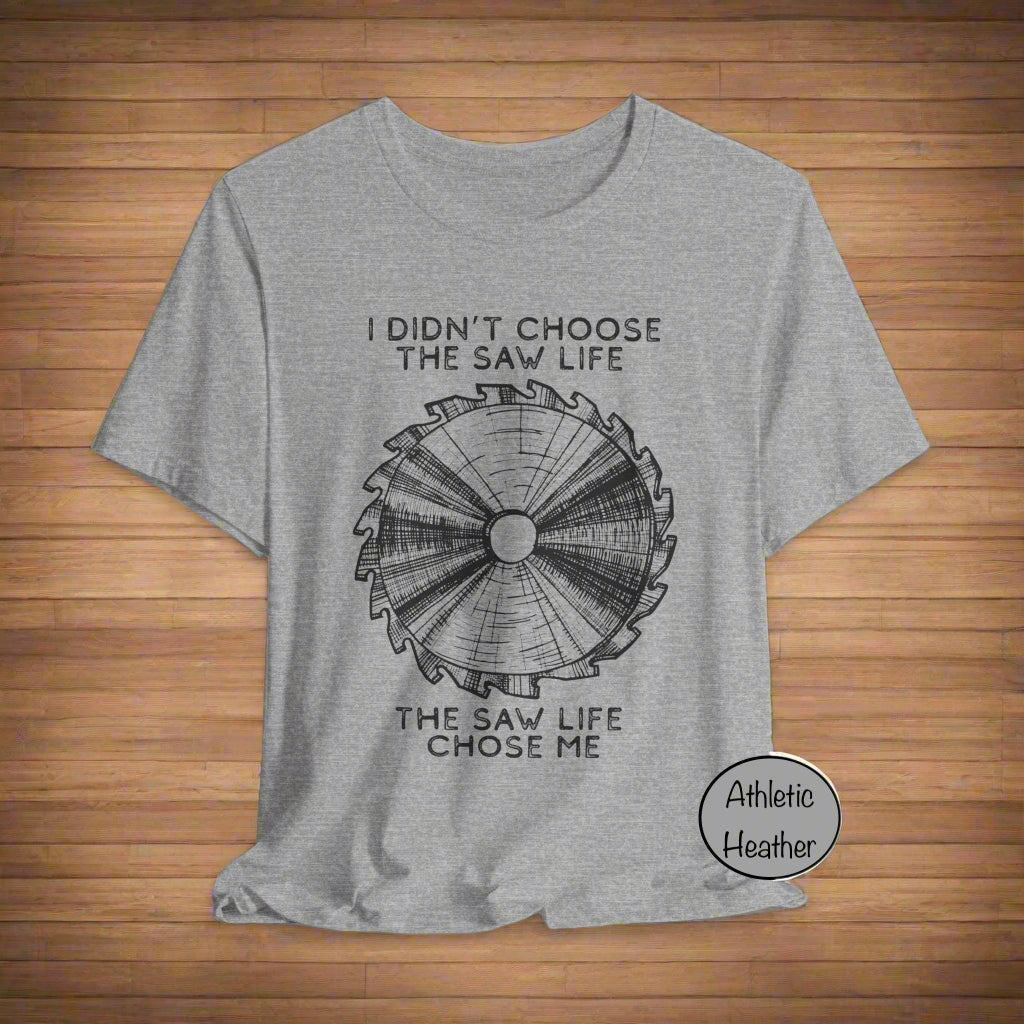 Gray t-shirt with sawmill design and text on a white background