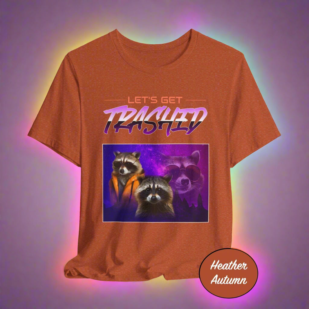 Brown t-shirt with raccoon graphic and 'Let's Get Trashed' text on a light gray background