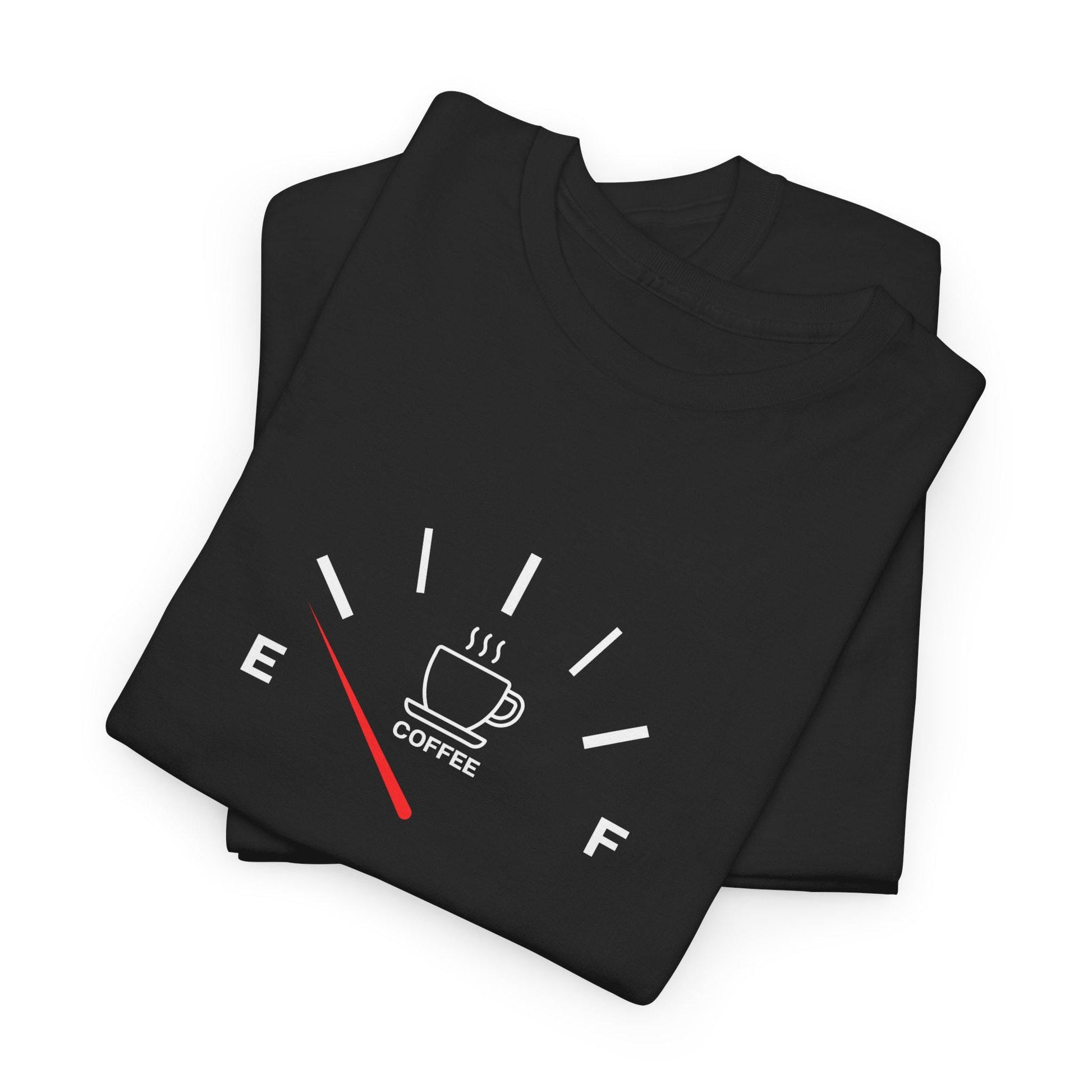 Folded black t-shirt with coffee-themed design on a white background