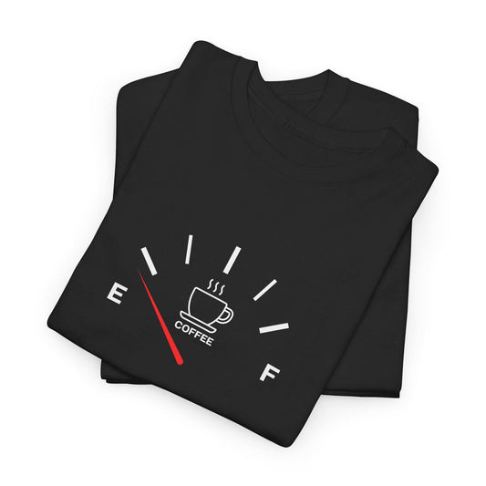 Folded black t-shirt with coffee-themed design on a white background