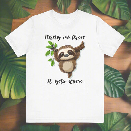 White t-shirt with a sloth graphic and text on a black background
