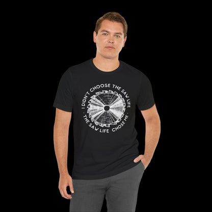 Man wearing a black t-shirt with a graphic design and text on a white background