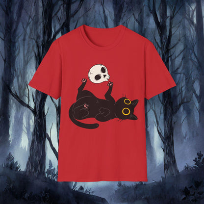 Red t-shirt with a black cat and skull design against a dark forest background
