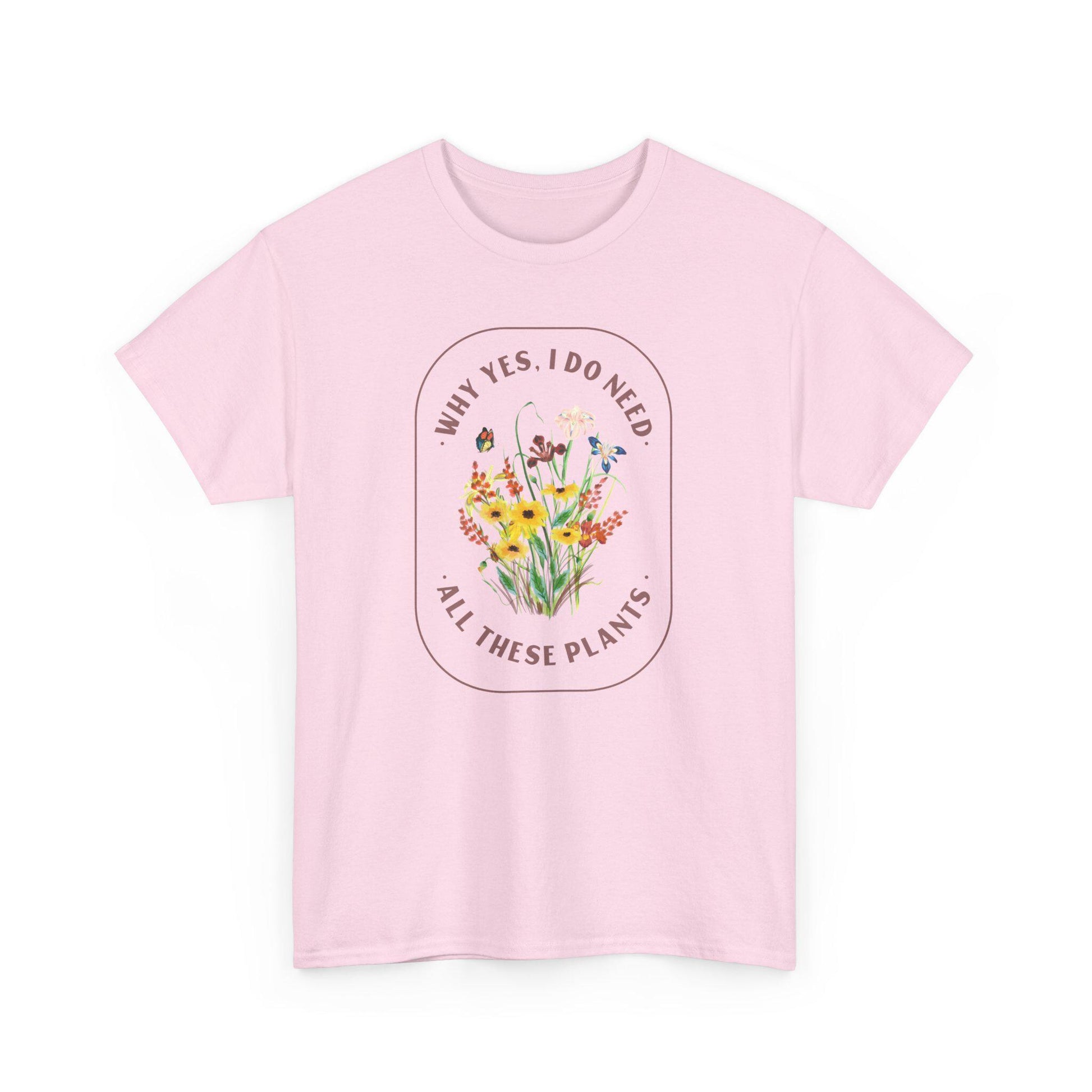 Pink t-shirt with floral design and text on a white background