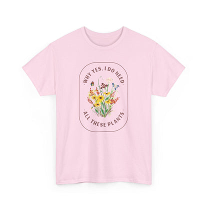 Pink t-shirt with floral design and text on a white background