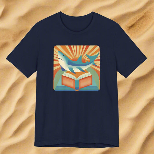 Navy blue t-shirt with a colorful graphic of a shark reading a book on a white background