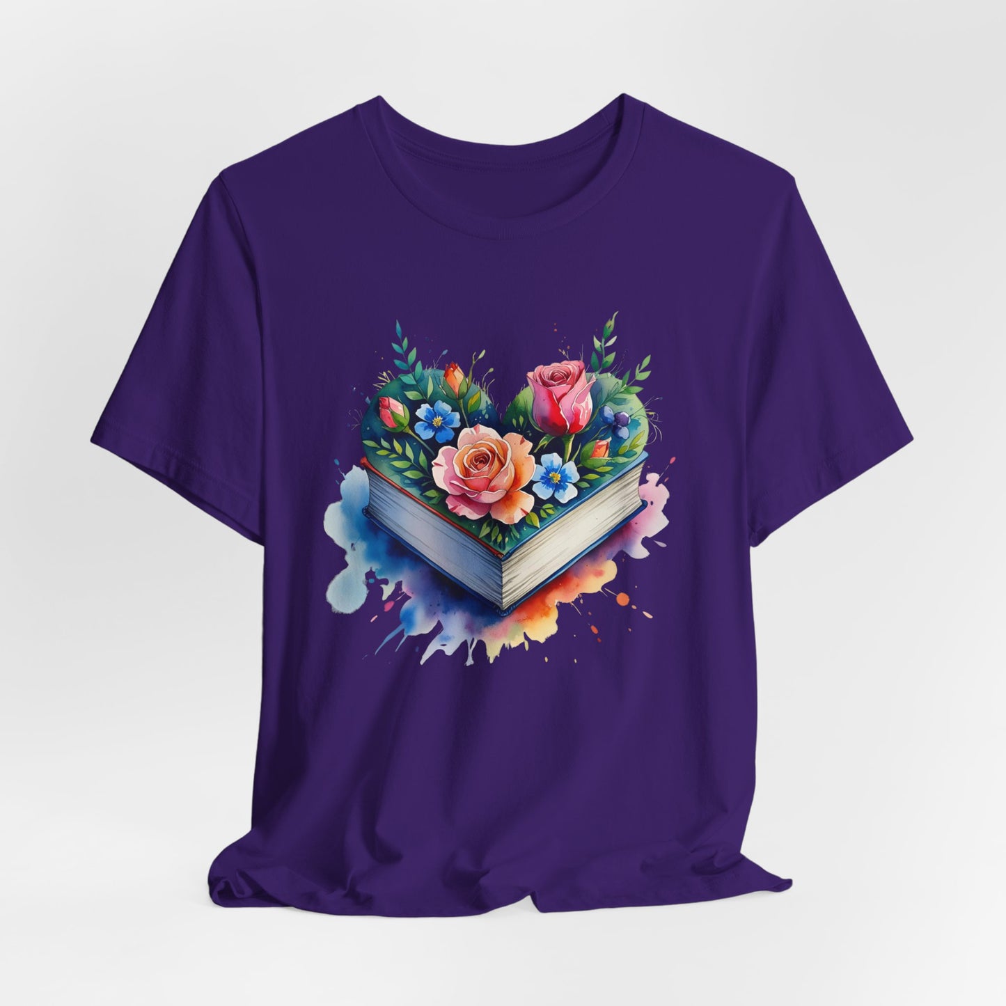 Purple t-shirt with a floral book design on a white background