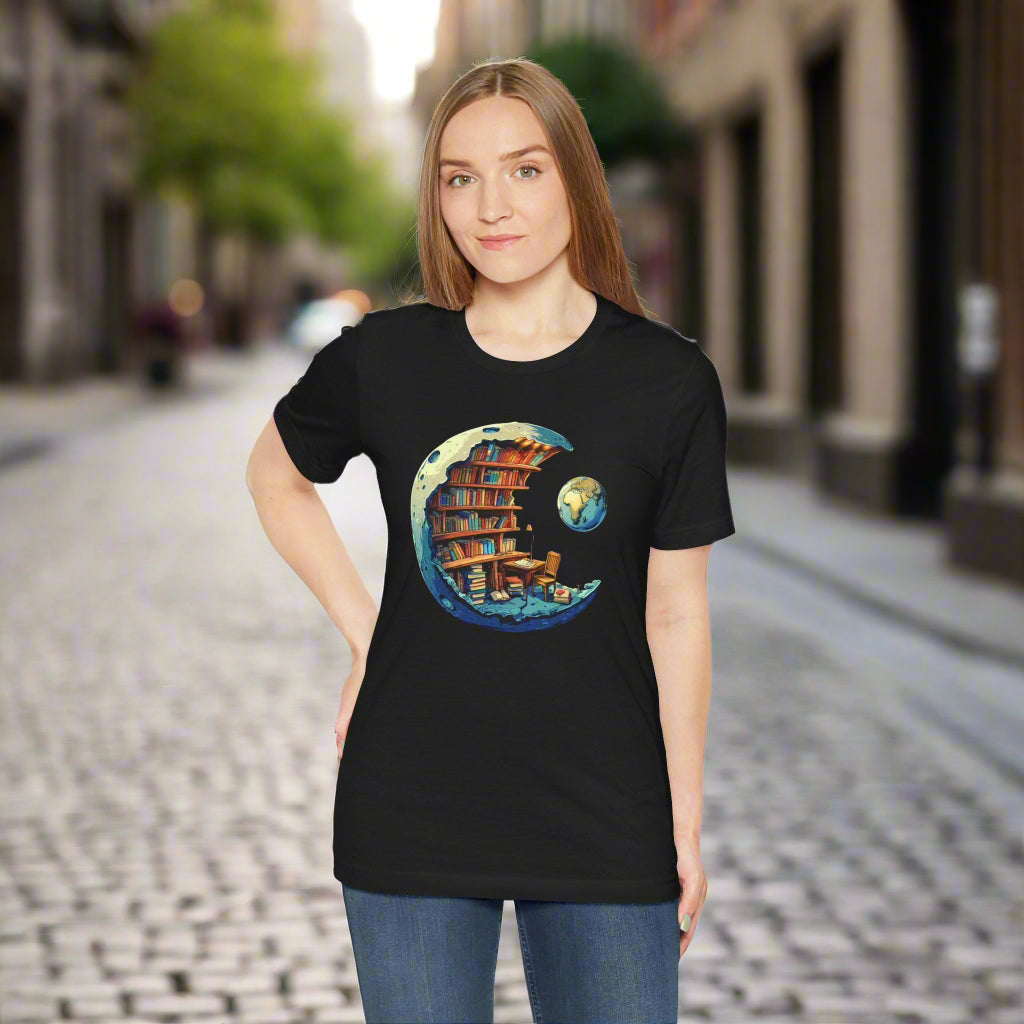 Person wearing a black t-shirt with a graphic design of a bookshelf on the moon.