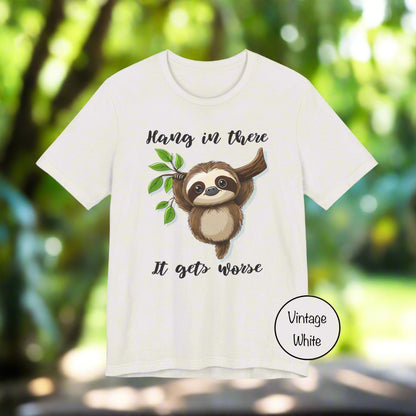 White t-shirt with a sloth graphic and text 'Hang in there, it gets worse' on a white background.