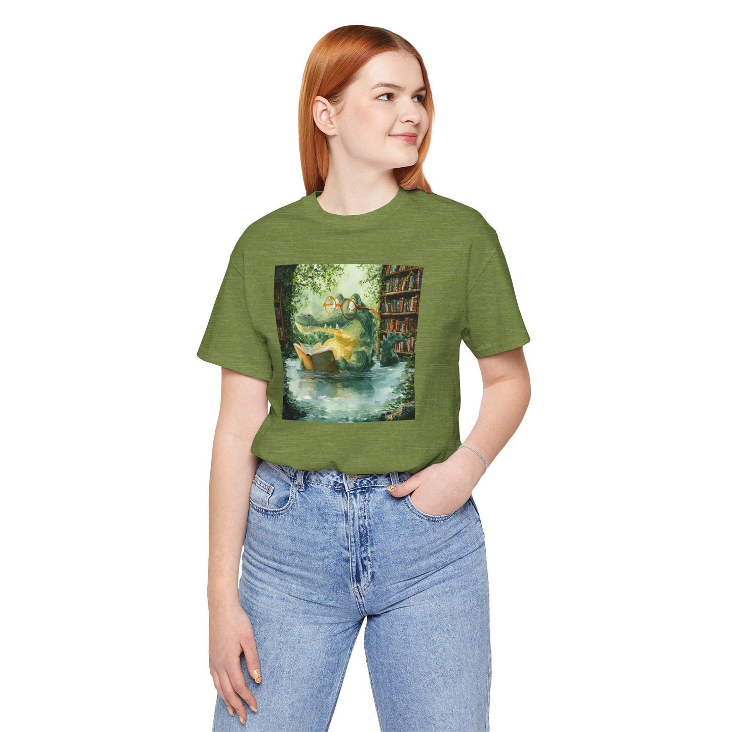 Person wearing a green t-shirt with a graphic design on a white background